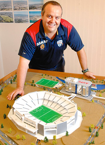 Dario Fontanarosa, chairman of Adelaide United, with a model of the new socccer stadium proposal.
