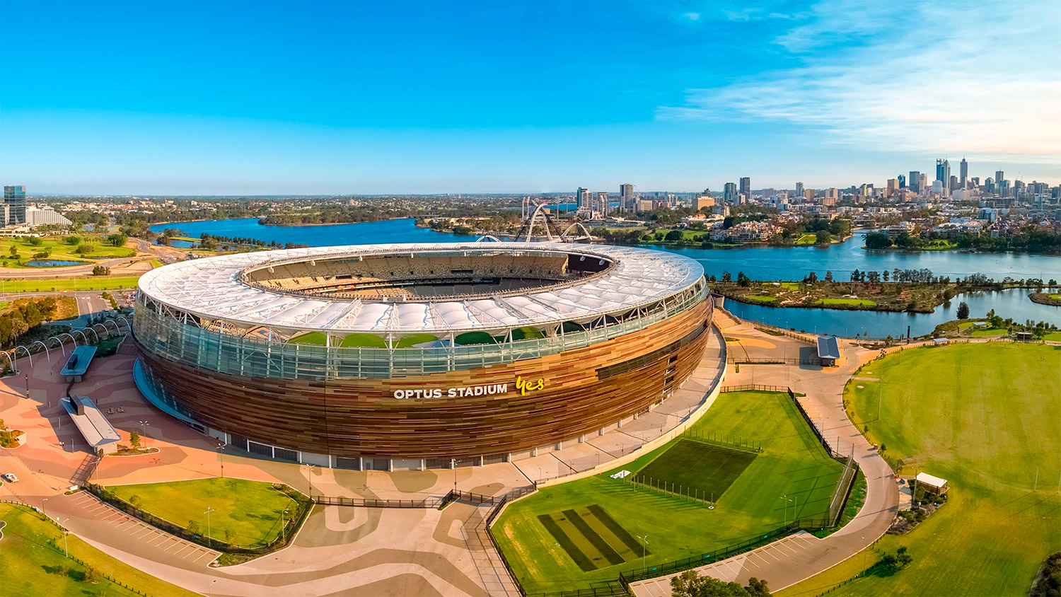 Aerial view of Optus Stadium looking towards the city of Perth